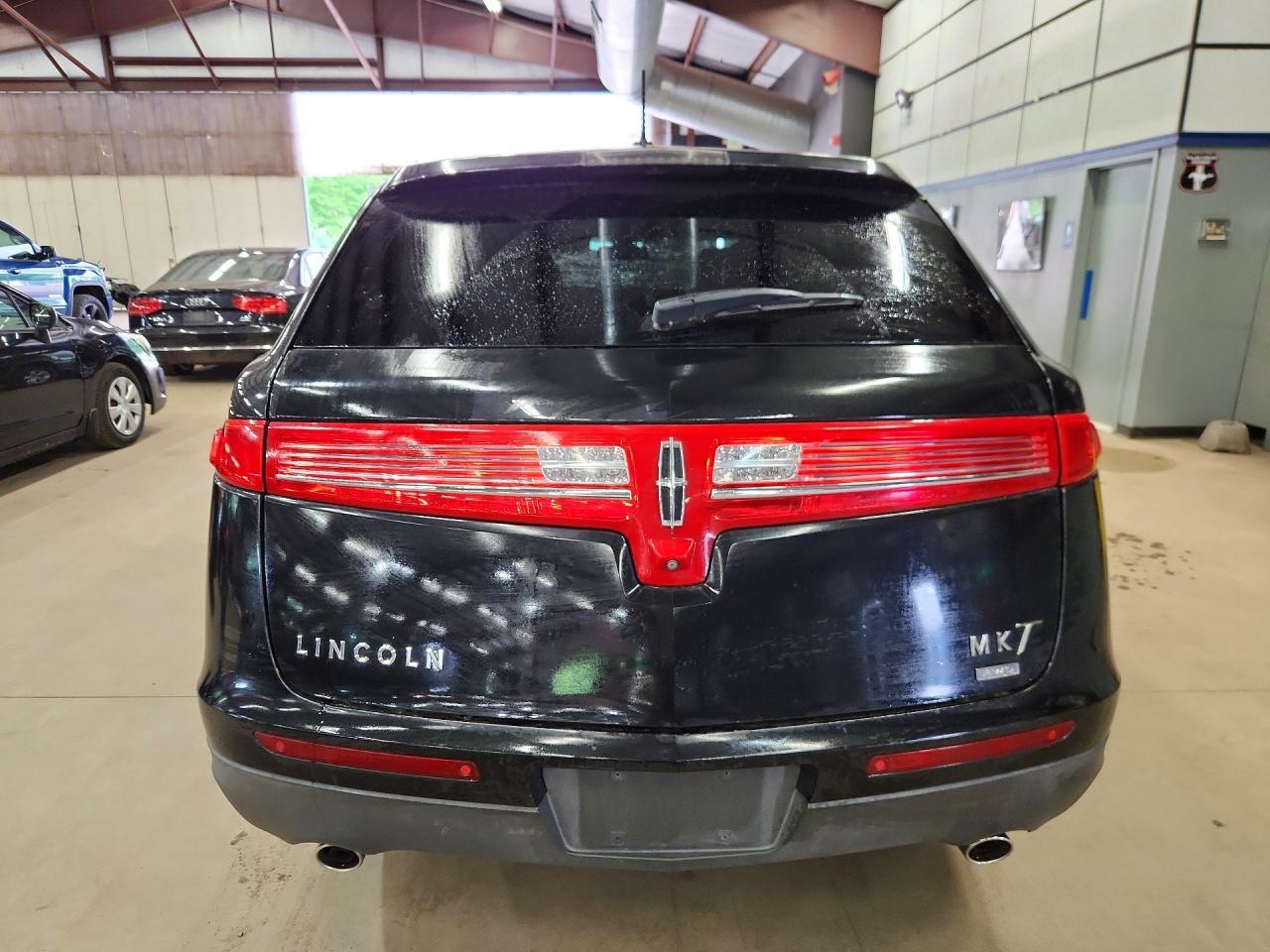 2014 LINCOLN MKT — фото 6