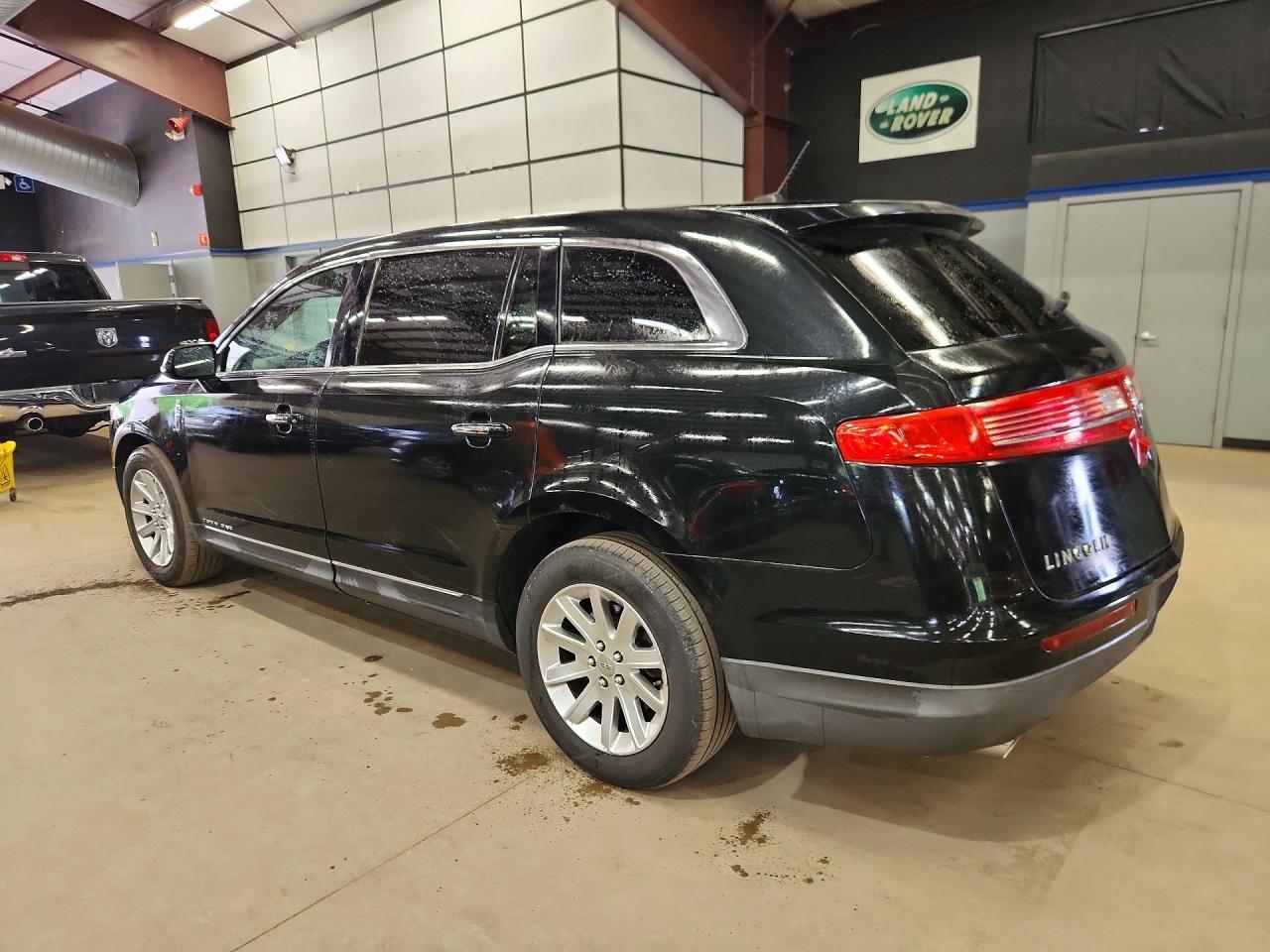 2014 LINCOLN MKT — фото 2