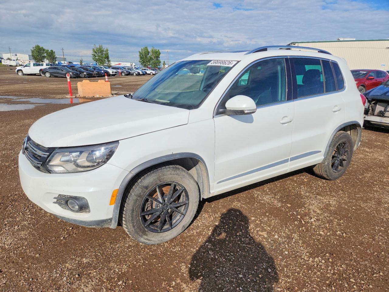 2016 VOLKSWAGEN TIGUAN — фото 1