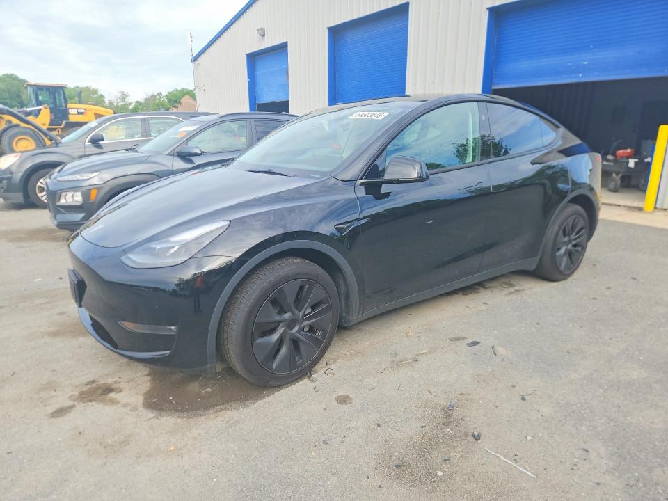 2025 Tesla Model Y — фото 1