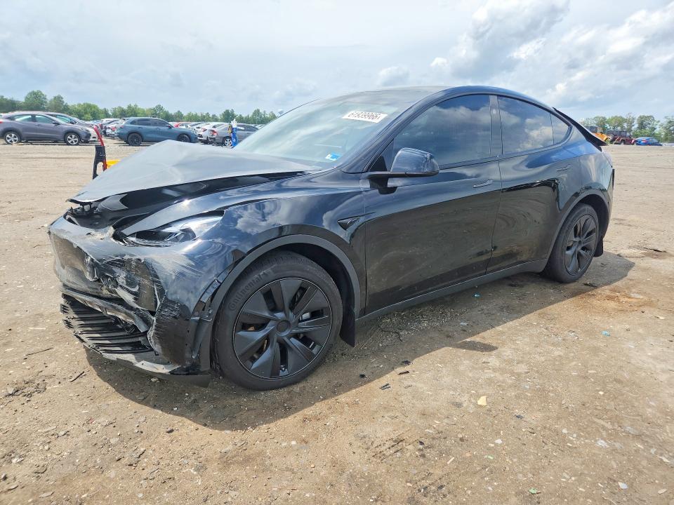 2025 Tesla Model Y — фото 1